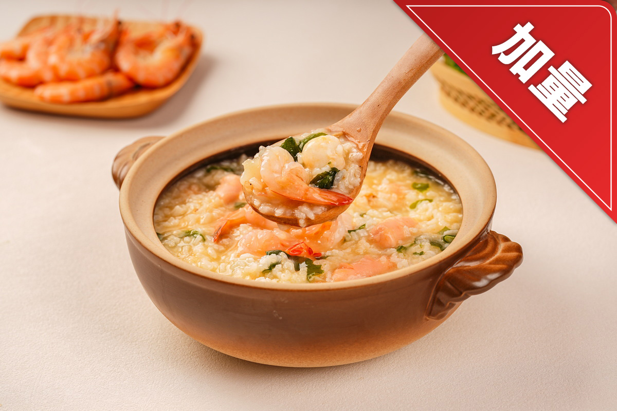 Gachas de arroz con cangrejo y mariscos